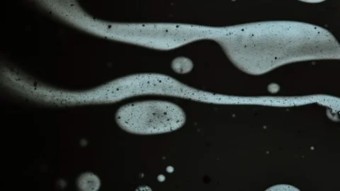 Fluid looks like molecules in macro mode Stock Footage 127239579