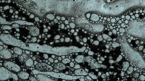 Fluid looks like molecules in macro mode Stock Footage 127242291