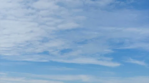 Fluid multi clouds in a blue sky Time-lapse Full HD Stock Footage 155288231