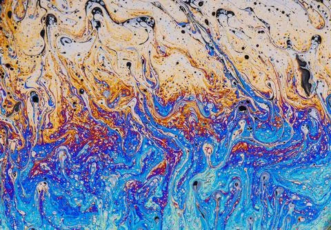 Fluid soap bubble psychedelic colorful abstract art Stock Photos