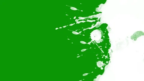 Fluid splash bursting and spreading across full screen on green screen. Stock Footage 335742964