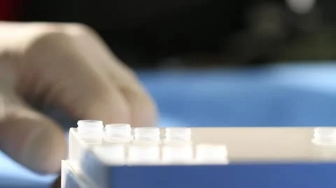 Fluid transfer between graduated cylinders Stock Footage 20446996