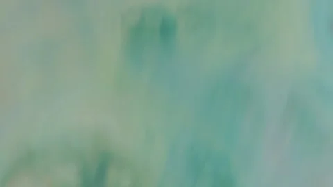 A fluidly moving abstract background with a delicate, flowing texture and a soft Vídeos de archivo 338378471