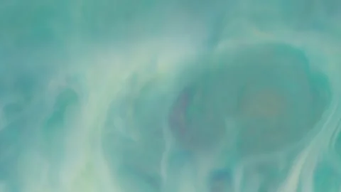 A fluidly moving abstract background with a delicate, flowing texture and a soft Video stock 338378765