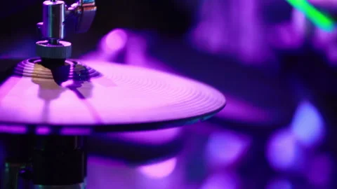 Fluorescent drum sticks knocking on hi-hat in the night. Stock Footage 140647702