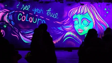 Fluorescent graffiti on the wall in Helsinki Stock Footage 84453327