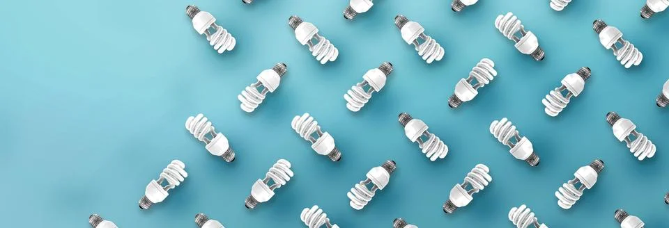 Fluorescent Light Bulb pattern on blue background. Stock Photos
