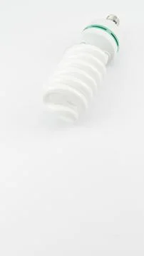 Fluorescent light bulb on white background Stock Photos