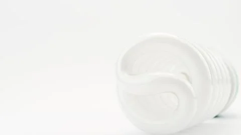 Fluorescent light bulb on white background Stock Photos