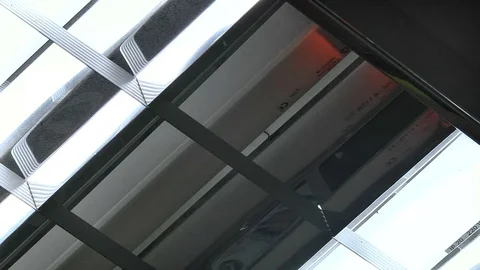 The fluorescent lights flicker Stock Footage 72845798