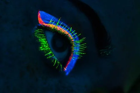 A fluorescent makeup on eye Stock Photos