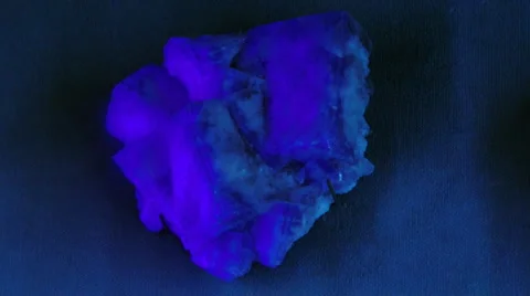 Fluorescent rock under UV and white light Video stock 1847787