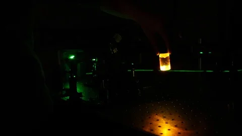 Fluorescent substance glows when activated by laser light Stock Footage 112635326