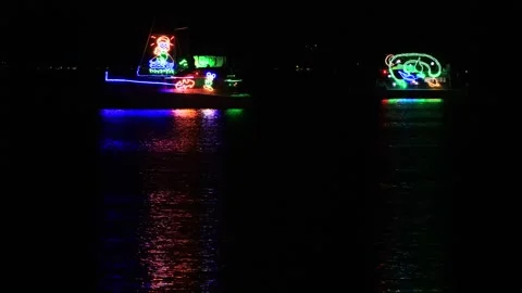 Fluoro fleet bright night on Lake Macquarie at Warners bay beach Australia 4k. Stock Footage 254735530