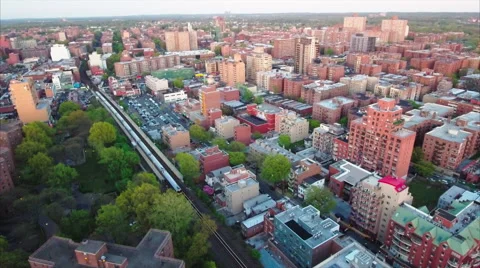 Flushing Meadows Queens Slow Panning Aerial Viewing Buildings &amp; Trees &amp; Train 스톡 동영상 62820747
