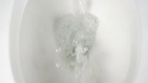 Flushing toilet close up Stock Footage 102903869