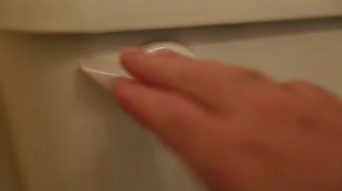Flushing the toilet Stock Footage 32821319