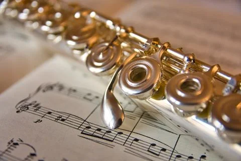 Flute Instrument on the note. Stock Photos