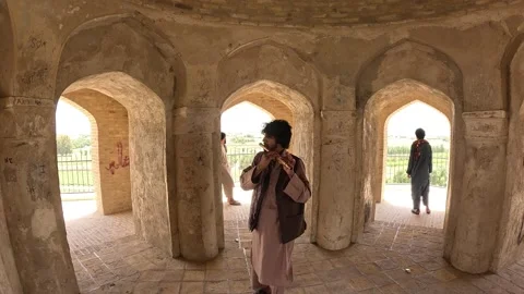 Flute Player at Bala Hisar Citadel, Balkh, Afghanistan Stock Footage 339303221