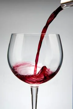 Flute of red whine Stock Photos
