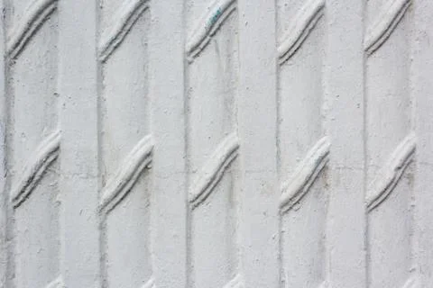 Fluted plaster background.The texture of the plastered wall. Rough corrugated Stock Photos