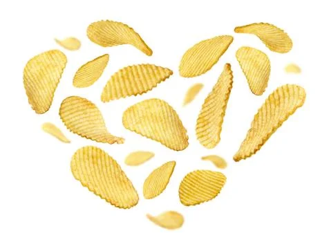 Fluted potato chips in the shape of a heart on a white background Fluted p... Foto stock