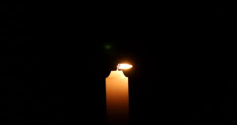 Fluttering candle lights at wind alive Stockbeeldmateriaal 162592669