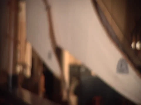 Fluttering model sail coming into focus, static Stock Footage 26189674