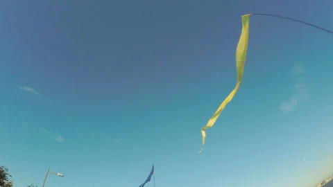 Fluttering ribbons on flagpoles 動画素材 90946050