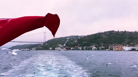 The fluttering of the Turkish flag against the backdrop of the Bosphorus Stock-Footage 207413436