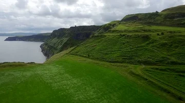Fly Above Carrick-a-Rede, Ireland. ( aerial footage Carrick-a-rede ) Stock Footage