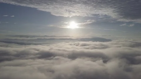 Fly above the clouds during sunrise. Stock Footage 80014191