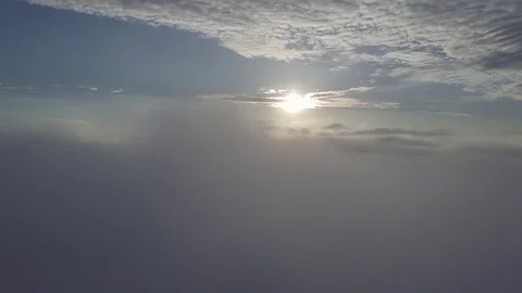Fly above the clouds during sunrise. Stock Footage 80014313