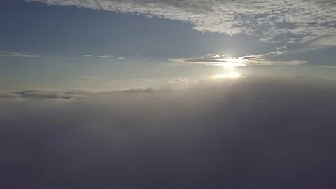 Fly above the clouds during sunrise. Stock Footage 80014382
