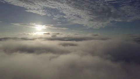 Fly above the clouds during sunrise. Stock Footage 80016435