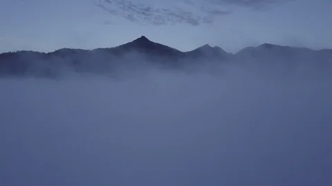 Fly above the clouds during sunrise. Stock Footage 80016972