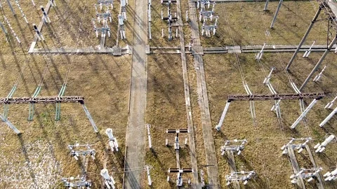 Fly above high voltage electricity pylon tower and power lines. Stock Footage 125879577