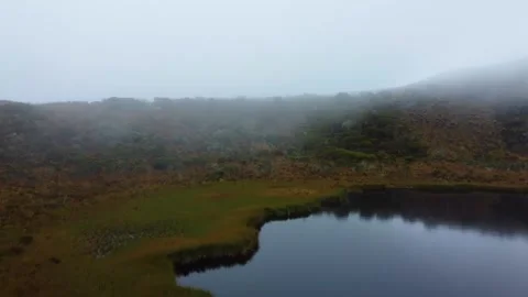 Fly above the paramo lagoon (black lagoon) Vídeo Stock 287709834