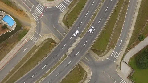 Fly above a road intersection Stock Footage 100667677