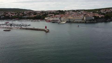 Fly across Lighthouse on Blue Bay Island Krk Croatia to Old City 库存影片 232616328