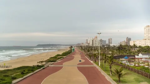 Fly along beachfront promenade Stock Footage 145343473