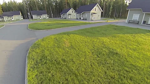 Fly along the houses and forests. HD Stock Footage 58563553