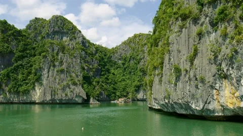 Fly along impressive carst limestone cliffs of ha long bay Vietnam Stock Footage 61495601