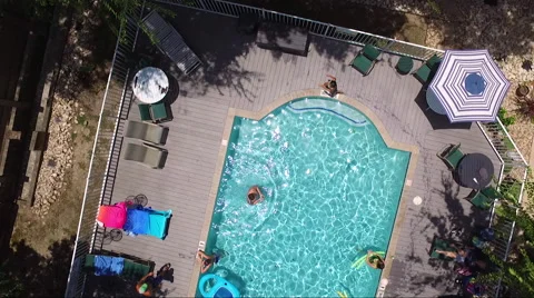 Fly And Hover Over Pool Activities Stock Footage 65795566