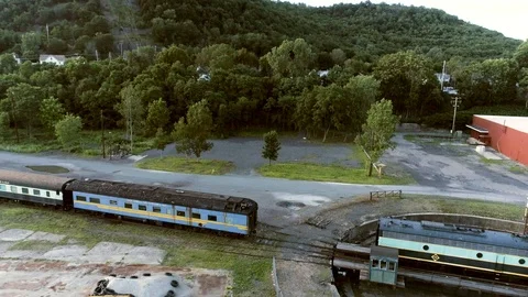 Fly up and Pan Down to Train on Turntable Stock Footage 91901191