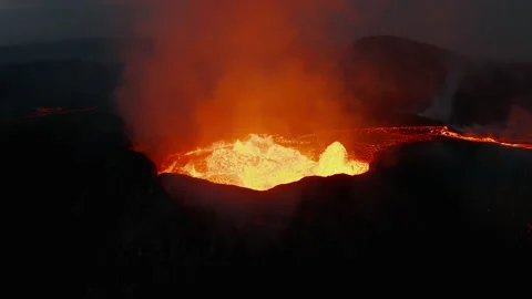 Fly around active volcano. Close-up of boiling molten magma in crater. Power of Stock Footage 160201847