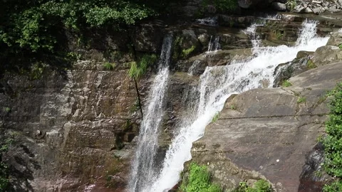 Fly around big waterfall Polikarya in Caucasian mountains Sochi Video stock 204728530
