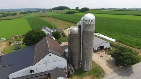 A fly around drone shot of a rural farm and silo in Lancaster PA 스톡 동영상 68489331