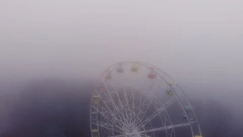Fly around ferris wheel in mist, Silence atmosphere Stock Footage 105806528
