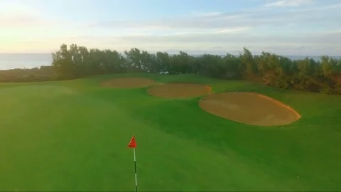 Fly around the golf pin on the sunset background Stock-Footage 73518120